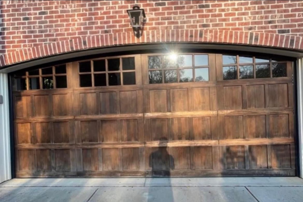 Garage doors before second refinish