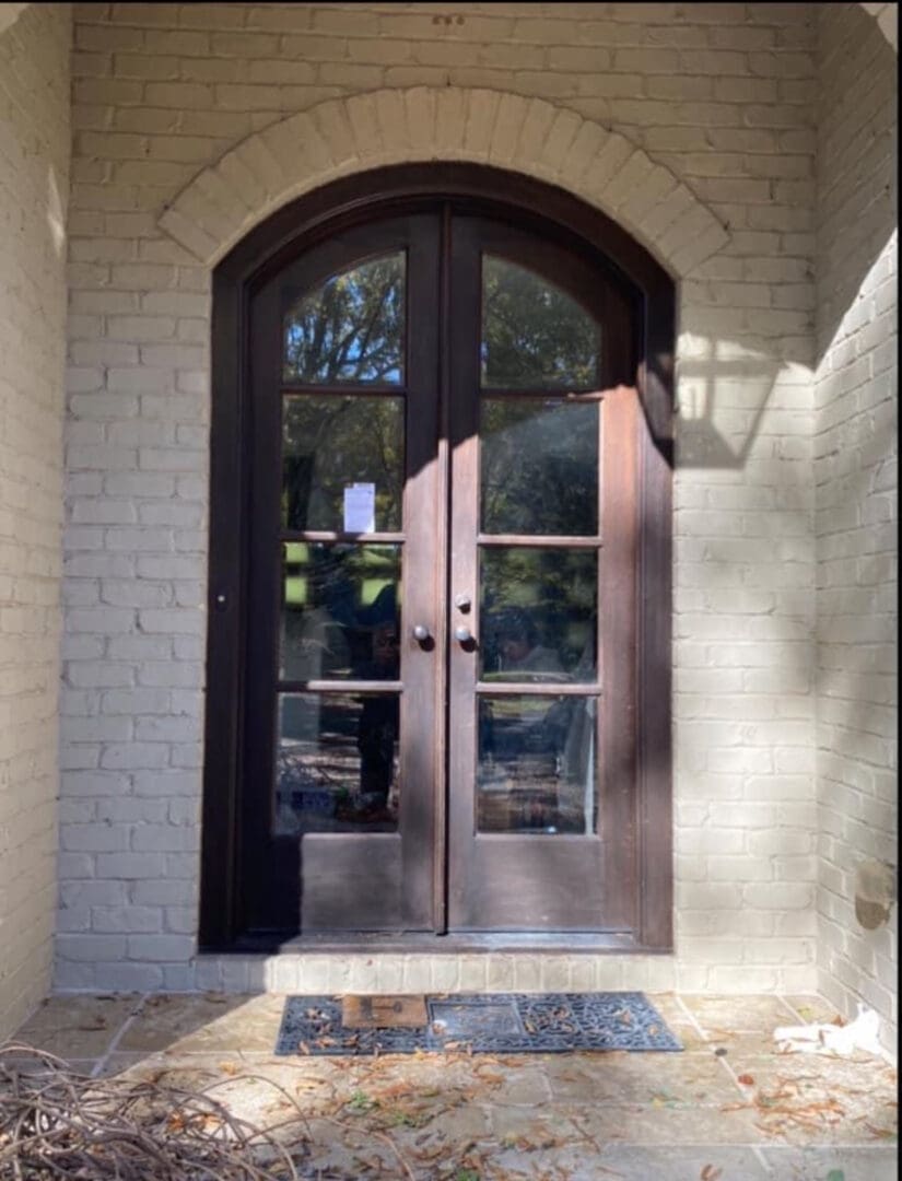Front doors before refinishing